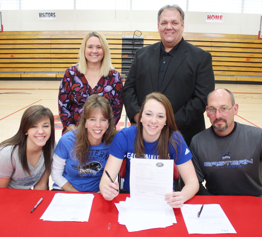 Photo by RR Best Sullivan’s Brittin Boyer officially signed her letter of intent to play basketball at Eastern Illinois University last Thursday afternoon. Pictured, front row, left to right are: sister Kailyn Boyer, mother Sara Boyer, Brittin Boyer, and father Dave Boyer. Back row, left to right: Sullivan girls’ head coach Sheri McCain, and Central Illinois Storm head coach Barry Wolfe.