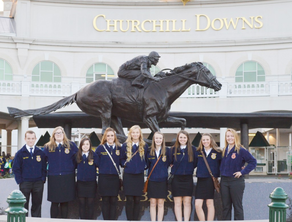 Submitted by Aspen Cassady OV FFA Attends National Convention Okaw Valley’s FFA traveled with nine of its members to Louisville, Ky. in October for the National FFA Convention. While there students were involved in numerous activities including a private tour with Churchill Downs trainers and jockeys, a tour through the SeaWorld exhibit and numerous other educational exhibits at the convention center. Among all of this the students were able to witness several motivational speakers discussing how to prepare for the future. “The five hour journey always is a highlight for FFA members every year at Okaw Valley so this gives students something to work hard for,” said senior Amy Orris who was one of the nine chosen to go. In addition to this trip being educational, it also afforded members of what opportunities lie ahead for them in their FFA career. Since the National FFA Convention has one of the largest career shows, students may plan for their future with popular colleges and big companies. 