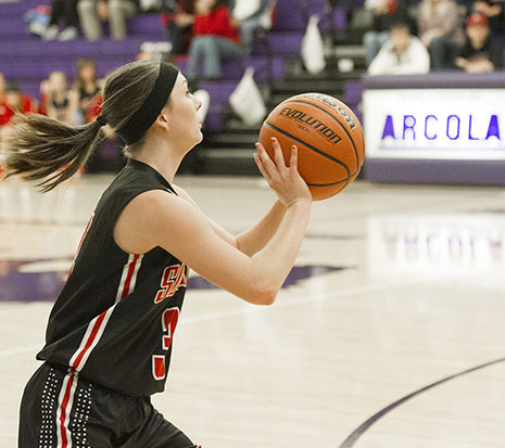 Photo by Keith Stewart Sullivan's Alyssa Marshall prepares to strike from beyond the perimeter Monday night. The junior point guard scored 17 points off five 3-pointers to help her team to a 59-30 win over Arcola.