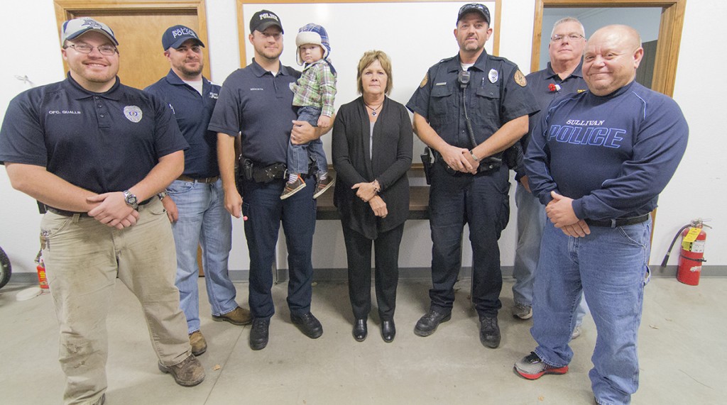 Photo by Keith Stewart Pictured are members of the Sullivan police department, from left to right: Josh Qualls, Adam Collins, Brandon Beckwith & son Bryson ,  Janet Dirks, Andrew Pistorius, John Love,  and Jim Waggoner.