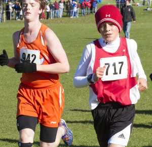 Photo by Keith Stewart ALAH’s Logan Hall (no. 717) runs past Urbana University’s Grant Allen Saturday. Hall went on to finish 51st overall.