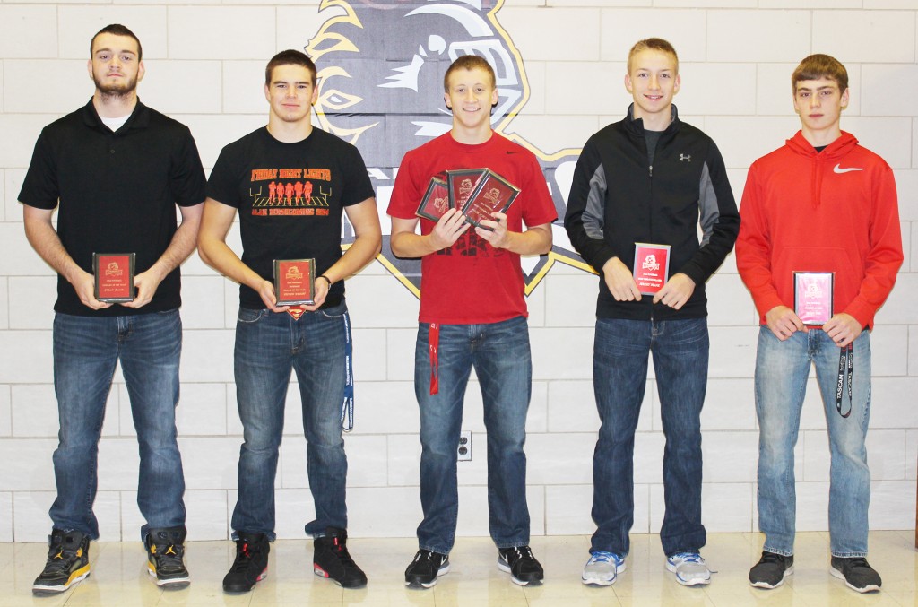 Photo by Sally McCarthy ALAH Football Awards The Arthur-Lovington/Atwood-Hammond football team held their awards’ banquet earlier this year following the conclusion of their season. Pictured, left to right: Dylan Black - lineman of the year, and 1st team all-LOVC defensive line; Steven Wright - defensive player of the year, and 1st team all-LOVC running back and linebacker; Tyler Schuring - offensive player of the year, MVP, all time records for passing, rushing and total offense, selection to the 1A All-State Football Team, and 1st team all-LOVC quarterback and defensive back; Jeremy Plank - most improved; Teddy Poe - coach’s award. Not pictured Kyle Feagin - special teams player of the year, and 1st team all-LOVC wide receiver, punter, and kicker; David Rosenbaum 1st team all-LOVC offensive line and honorable mention defensive line; Nathan Rose honorable mention defensive back; Graeme Stewart, honorable mention offensive line.