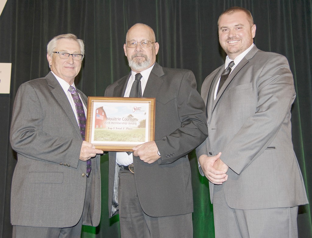 Submitted Moultrie County Farm Bureau First in State The Moultrie County Farm Bureau was honored with the 2014 Membership Award of first place for total quota in the state. Pictured (left to right) are Richard Guebert Jr., Illinois Farm Bureau President, Andy Bolsen, Moultrie County Farm Bureau President, and Tyler Harvey, Moultrie County Farm Bureau Manager. 