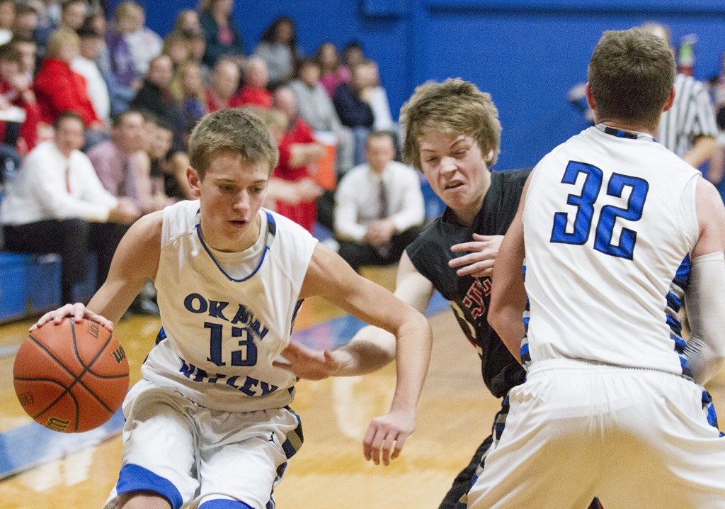 Photo by Keith Stewart Okaw Valley’s Dylan Park (no. 13) gets around the pick set by teammate Joe Jeffers on Sullivan’s Kaleb Shumard Tuesday night. Despite Park’s 18 points, the Timberwolves fell behind in the fourth quarter and eventually lost 50-44.