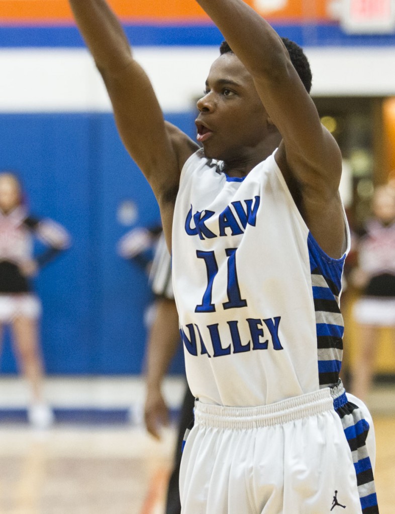 Photo by Keith Stewart Okaw Valley's Pierce Bradford watches his 3-point attempt Tuesday evening. Bradford sank three from the arc in an attempt to lift his team to a comeback that ultimately fell short.