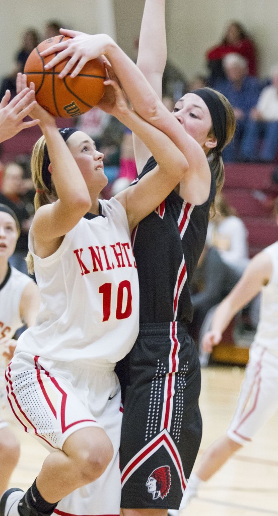 Photo by Keith Stewart Sullivan’s Brittin Boyer (right) blocks ALAH’s Madison Brown Monday night. Boyer was not only a force defensively for the Lady Redskins, but also offensively as she went off for 27 points, 6 rebounds, and 5 assists.