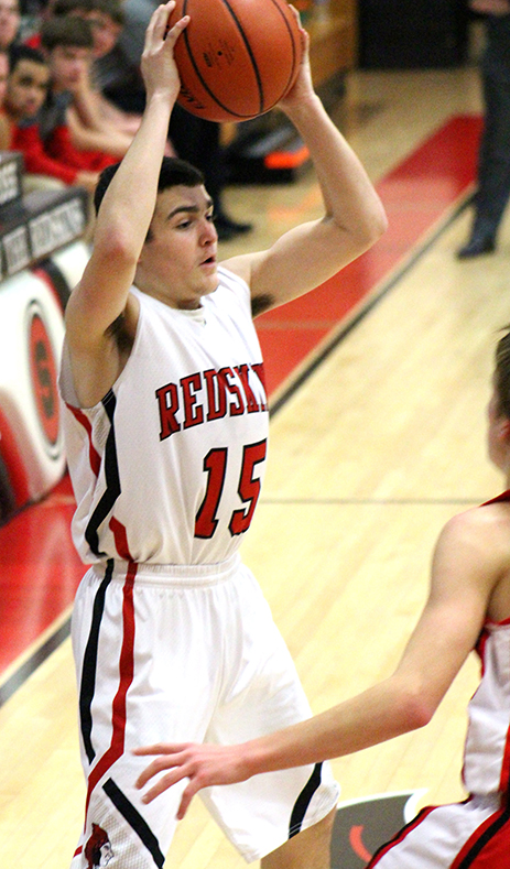 Photo by RR Best Jacob Piper eyes a potential pass inside Saturday against Neoga. 