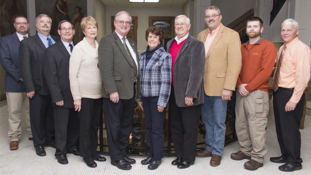 Photo by Keith Stewart Last month, the county board, acting in their new capacity with recently elected Billy Voyles joining the board, formally agreed to contract with Coles County’s 911 center to make improvements to Moultrie’s emergency phone services. Pictured, from left to right: Billy Voyles, Kevin McReynolds, Roger Glazebrook, Arlene Aschermann, Dave McCabe, county clerk Georgia England, Ron White, Gary Smith, Tim Rose, and Todd Maxedon. McCabe was voted to retain the chairmanship, and White was again chosen as vice-chairman at their reorganization meeting in December.