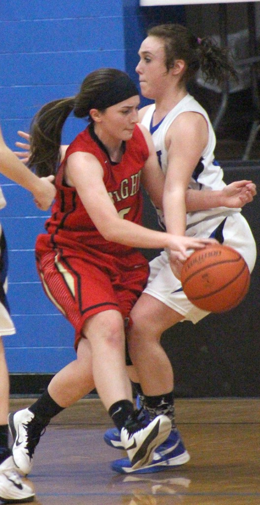 Photo by RR Best Mycaela Miller tries to dribble inside against Okaw Valley’s Jessica Robinson Thursday.