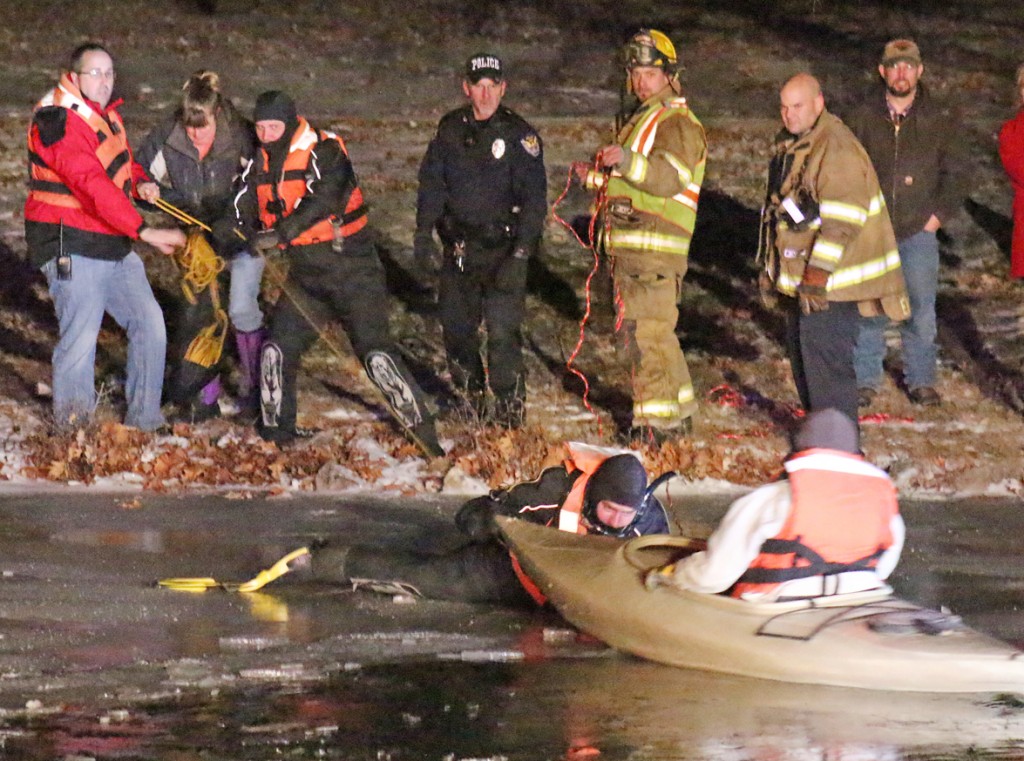 Photo by RR Best Dive Team Rescue at Mason Point The Moultrie County Dive Team helped rescue a 12-year-old boy last Thursday evening after his kayak became stuck in a pond at Mason Point. According to dive team commander Clay Brush, the boy was kayaking, but the pond began to refreeze around him. The boy grew afraid that his kayak would capsize should it suddenly find itself on top of the ice. The call for help came in at 6:07 p.m. Thursday with the first responding agency on scene five minutes later. The scene was then cleared at 7:05 p.m. Brush added that the boy was wearing gloves and a hat, but that his hands had become wet. The dive team upon arrival supplied the boy with warm gloves, a new hat, and life jacket. Once divers were properly equipped, the team pulled the boy and his kayak ashore. According to the Sullivan fire department, the boy did undergo a medical evaluation but was released to his mother without further treatment. Mason Point administrator Darin Wall says that Mason Point has two ponds and that signage is posted around each stating that it is private property. Wall added that the boy was stuck in the pond located behind the two-story brick house and that the boy was stuck in an area of the pond estimated to be 2-3 feet deep. 