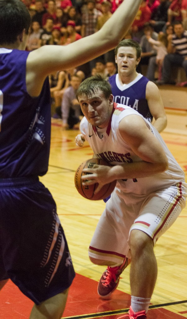 Photo by Keith Stewart Colton Yeakley looks to get inside the paint Friday night against Arcola. Yeakley finished the night with nine points and four rebounds.