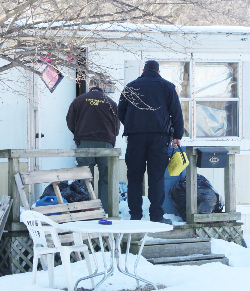 Photo by RR Best Authorities, including a member of the Illinois State Police Crime Scene Investigating unit were seen entering a residence at 503 W. McGill in Sullivan Thursday afternoon. Court records show that the residence belongs to Michael S. Yost, the man who was found with stab wounds Wednesday morning in addition to Sheri Randall, who was pronounced dead at the scene. Investigators are calling last Wednesday’s incident a homicide.