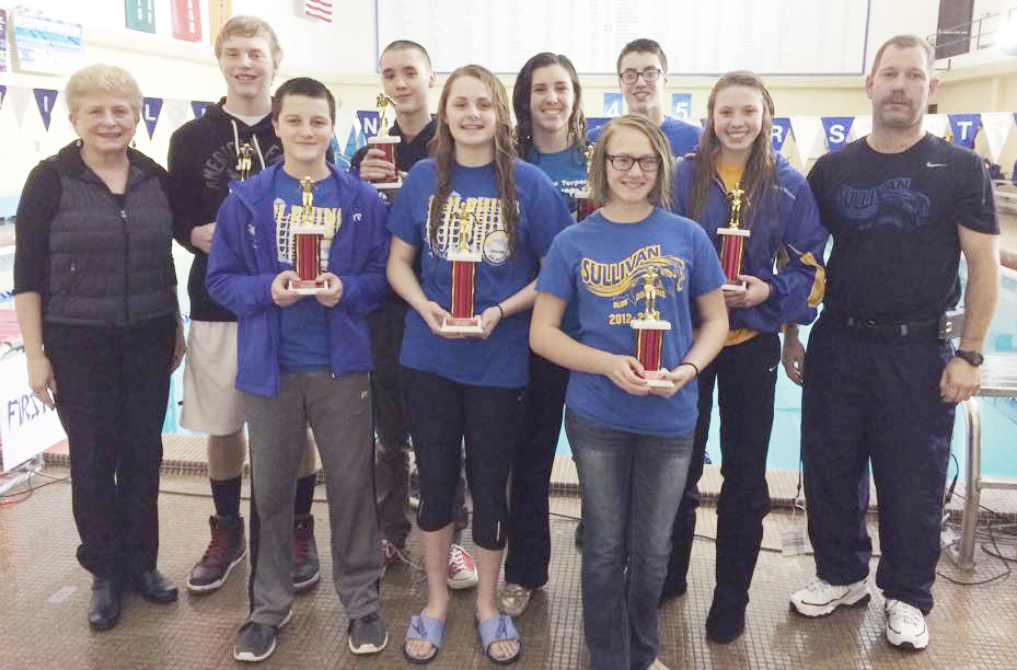 Submitted Seth Dunscomb 14th Annual Opener The Sullivan Blue Dophins entered 58 swimmers in the 14th annual Seth Dunscomb New Year’s Opener in January. Pictured left to right are Connie Dunscomb, Dalace Ray, Brodie Goss, Dylan Sanders, McKenna Kull, Brynna Sentel, Calista Clark, Charlie Goss, Anna Wooter, and coach Jason Drury (not pictured is Noah Spain). Seth Dunscomb began his swimming career with the Sullivan Blue Dophins when he was just a boy. Each year, the dolphins remember him when they attend the Seth Dunscomb New Year’s Opener in Decatur. Dunscomb was a record-setting swimmer who died suddenly of a heart ailment in 1997 during a practice for the University of Kansas swim team. Dunscomb was a state champion in the 200-yard individual medley while at Sullivan High School and still holds 16 records with the Sullivan Blue Dolphins that have not been broken in more than 15 years. This year marked the 14th year the meet has been held at Millikin University’s Griswold Center.  With ages ranging from 5 to 18 years old in a total of 506 races, the Dolphins brought home a hefty amount of hardware, with the following swimmers receiving overall trophies: Open Division - Brynna Sentel 1st place; Charlie Goss 2nd place; Dalace Ray 3rd place.13-14 age group - McKenna Kull 1st place; Anna Wooters 2nd place;  Brodie Goss 2nd place; Dylan Sanders 3rd place. 11 - 12 age group - Calista Clark 3rd place. 9 -10 age group  - Noah Spain 3rd place.