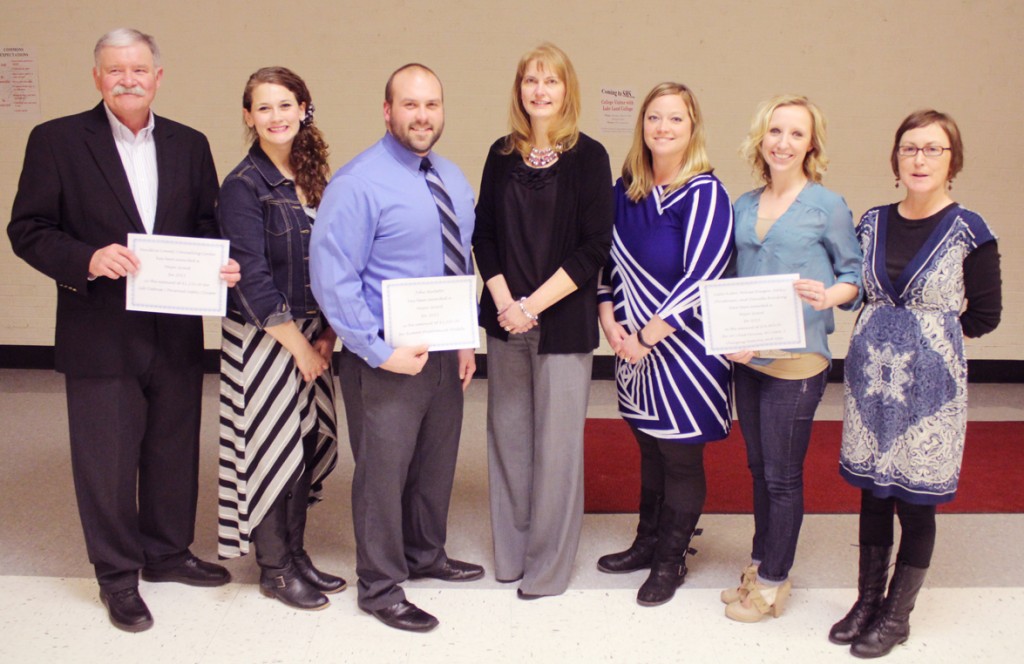 Photos by RR Best SCEF Awards The Sullivan Community Education Foundation held its annual District Staff Appreciation Dinner funded by the SCEDF on March 19 where $26,897 in grants were awarded to the Sullivan community and school district. Pictured, above, (from left to right) are the major grant award winners which included the Moultrie County Counseling Center represented by David Cole and Katrina Shain ($1,250 for basic self-defense and personal safety classes); SHS science teacher John Bertetto ($2,000 for human anatomical models) and the SES second grade teachers represented by Leslie Auten, Melissa Haegen, Ashley Christensen, and Danielle Braiding ($14,969 for 30 iPad air tablets with cases and charging cabinets). Pictured, below, are the minor grant award winners, which included student Wesley Standerfer and SES teacher Lynette Rotramel ($650 for a Nikon camera, tripod, and replacement insurance for school newspaper); Elizabeth Titus Library represented by Michelle Nolan ($500 Summer Reading Program); SMS teacher Marissa Wright ($900 for Canon T3i for SMS yearbook); SES social worker Poppy Graham ($800 for iPad and apps); SES second grade teachers represented by Haegen, Braiding, Christenson and Auten ($990 for Lexia Core 5 software for second graders); the Moultrie County Beacon represented by Kari Ruppert ($998 for two Wi-Fi iPad tablets); SHS athletic department represented by Chester Reeder ($501.38 for upgrade of SHS weight room); SES speech and language teachers represented by Jessica Reeder and Ann Osthoff ($930 for two iPad Air Tablets); Central Illinois Public Transit represented by Jennifer Moore ($960 for one day bus trips for senior citizens); SES special education teacher Christine Grohler ($950 for Hand in Hand Kids Summer Autism Camp); and the Sullivan preschool represented by Tonya Rose ($500 for two iPad minis). The Sullivan Community Education Foundation was formed in 1995. The mission statement of the Foundation is “to promote lifelong learning opportunities in its community and schools”.  The board is comprised of community and school district men and women who oversee the awarding of major and mini grants each year.  Since the formation, the SCEF has awarded more than $450,000 in grants.  This money is not tax money but funds obtained by donations and fund-raising.