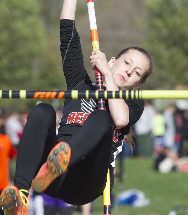 Photo by Keith Stewart Abby Cravatta eyes the bar during her pole vault attempt Tuesday. She would finish fourth reaching a height of 7-0.