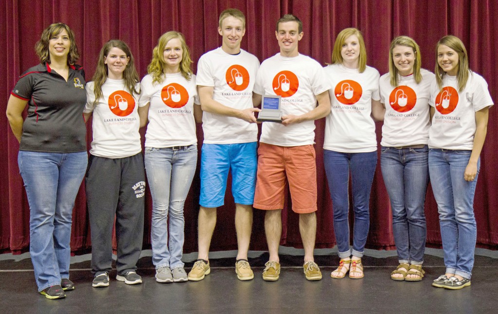 Submitted ALAH Earns First A group of Arthur-Lovington/Atwood-Hammond High School students placed first overall at the annual Business and Computer Contest at Lake Land College. Pictured, left to right: Coach Amanda Romine, Samantha Landers, Christy Allen, Jeremy Plank, Avery Schrock, Beth Lambdin, Elyse Harris, and Brooke Tabb.