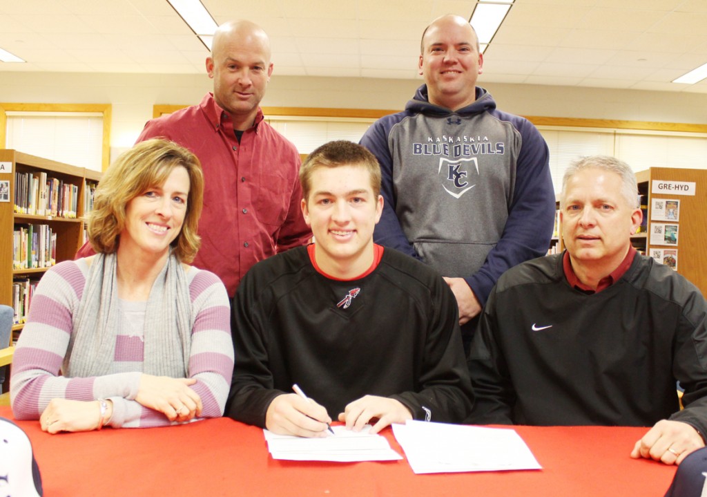 Photo by RR Best Sullivan senior and baseball player Nick Frerichs signs his letter of intent committing to play baseball at Kaskaskia college in a January 22 ceremony. Pictured, front row, left to right: Mother Kerri, Nick, and father Dan. Back row: Sullivan head baseball coach Troy Rogers and Kaskaskia head baseball coach Mitch Koester.