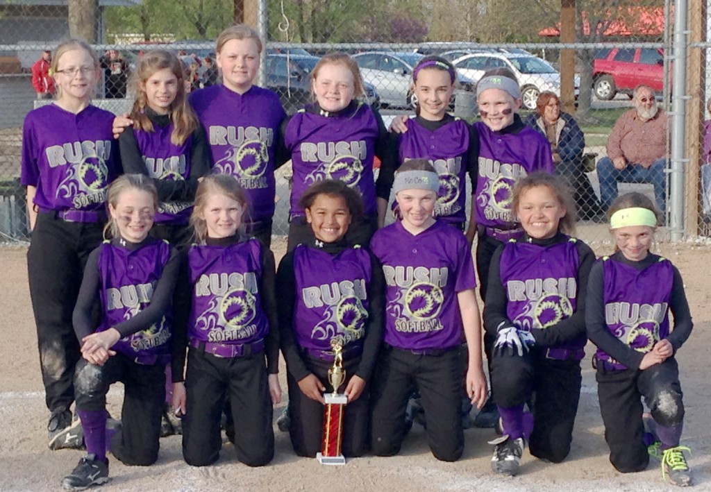 Submitted Mo-Co Rush Earns Second in Effingham The 2015 Mo-Co Rush 10U competed in their first tournament of the spring/summer the weekend of April 25-26 in Effingham. The Rush came away with a second place finish and qualified for the 2015 NSA World Series in Indianapolis.  The Rush started the weekend against the Mattoon Cobras and one of the best pitchers in the area in Karlie Bean. It was their first outing of the season against Bean, and the Rush lost the opener 6-0. The Rush then won five straight games over Jasper County, St. Anthony, CI Diamonds, Mattoon Pride, and the Cobras. The last two wins came off of last inning come from behind finishes. They trailed the Pride, a team that defeated them twice in the fall, 5-2 heading into the bottom of the third but rallied to score two in the third, one in the fourth, and one in the bottom of the fifth to win.  That win propelled them into the championship where they needed to defeat the Mattoon Cobras twice to win the title.  In game one the Rush were down 7-4 in the bottom of the sixth when they rallied to score four runs to win the game and force the extra game. However, the Rush ran out of gas and lost 9-1 to the Cobras and Bean in the finale. Hit leaders for the weekend were Sullivan’s Kinley Hill and Arthur’s Alisha Frederick, both with seven each, while three others had four hits each. The trio of Arcola’s Keira Hohlbauch, Sullivan’s Katie Honchell, and Arthur’s Ryli Kauffman pitched well all weekend.  Arthur’s Charley Condill also caught in six of the seven games and threw out eight base runners.  The Rush travel to Charleston and Terre Haute in May for their next two tournaments.  For more info on the Rush go to www.mocorush.com. Pictured front row, left to right: Bailey Bennett-Bethany, Alisha Frederick-Arthur, Alaina Moore-Sullivan, Ryli Kauffman-Arthur, Mikaela Moore-Sullivan, Mackenzie Condill-Arthur.  Back row: Kayla Schnippel-Mt. Zion, Mia Harris-Bethany, Kinley Hill-Sullivan, Keira Hohlbauch-Arcola, Charley Condill-Arthur, Katie Honchell-Sullivan.