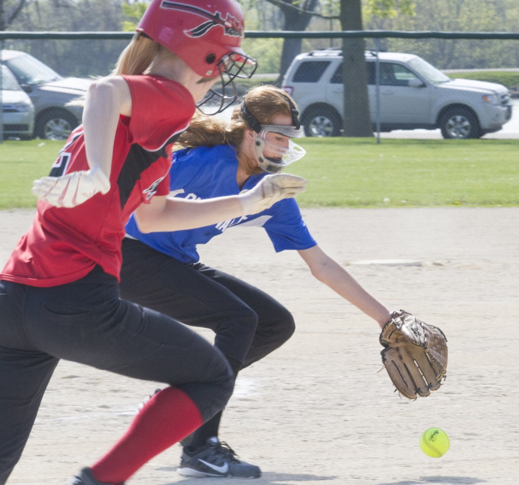 Photo by Keith Stewart Okaw Valley pitcher Amanda McClain chases down a bunt laid down by Sullivan’s Elissa Stewart Saturday.