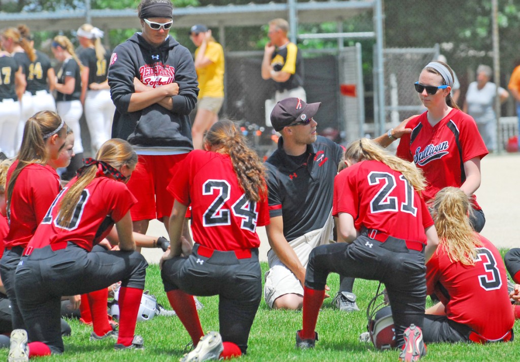 Photo by RR Best Head coach Ben Richter speaks with his team following the tough 2-1 regional championship loss to Tuscola Saturday.