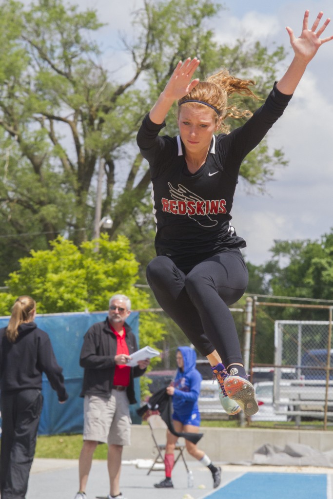 Photo by Keith Stewart SOV's Amanda McClain is seen midair during her jump of 18-8 1/2 Thursday at the state track meet preliminaries in Charleston. The jump would not only mark McClain's personal best, but also set a school record.