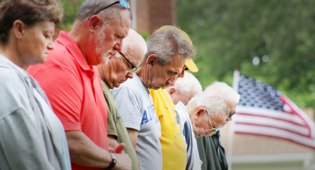 Photo by RR Best Paying Respect Several veterans bow their heads during Monday morning’s Memorial Day Service at the Marrowbone Township Cemetery in Bethany.