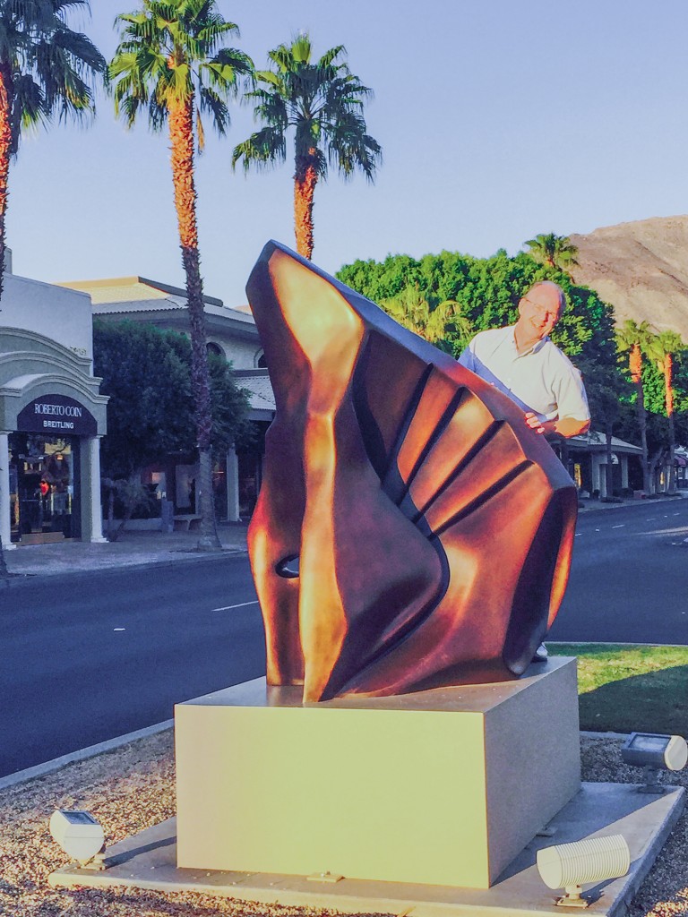 Photo submitted Pictured is Sullivan native Patrick Blythe seen behind his  eight foot tall bronze sculpture titled, “Harvest” which has been installed in the median of El Paseo, between Sage and Ocotilla in Palm Desert, Calif.