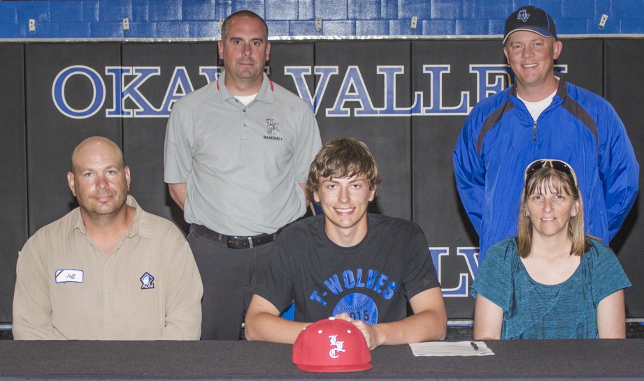 Photo by Keith Stewart Recent Okaw Valley graduate Devon still signed his letter of intent to play baseball at Lake Land College during a May 19 ceremony. Pictured, left to right, back row are: Lake Land head baseball coach Bill Jackson and OV head baseball coach Andrew Hagerman. Front row: father Jeff Still, Devon Still, and mother Rachel Still.