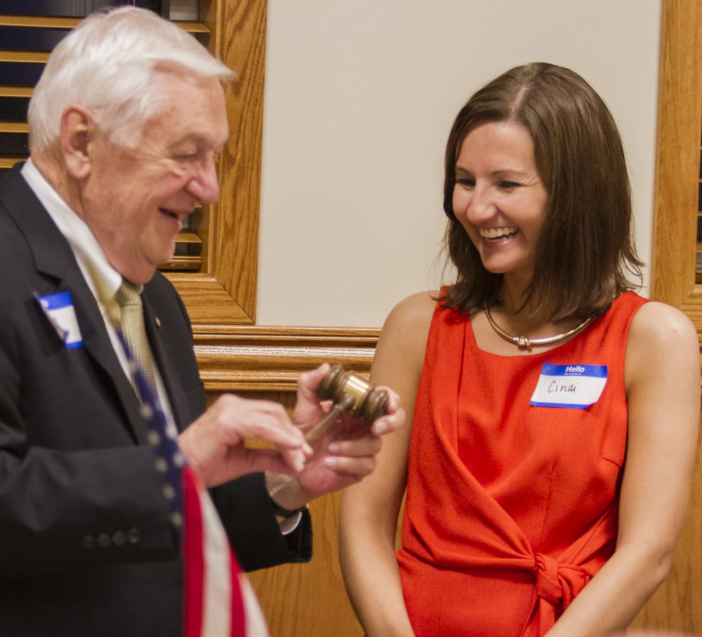 Photo by Keith Stewart Sullivan Kiwanis Club President Cindi Reed (right) is presented the club’s gavel by Jim Dooley as part of the charter ceremony Monday night.