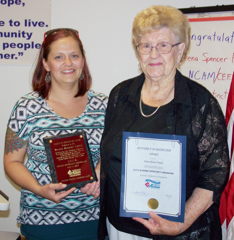 Submitted C.E.F.S. Economic Opportunity Corporation recognized the Serena Spencer family of Sullivan with the 2015 Family of Distinction Award. Pictured (Left to Right) Serena Spencer receives plaque and certificate from C.E.F.S. Board Chairperson Jean Finley.