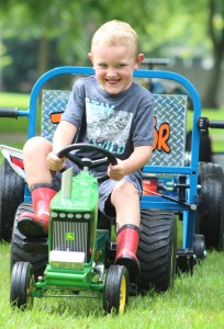 Photo by RR Best Asher Hendry pedals excitedly during the pedal pulls.