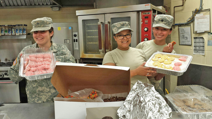 Photo by RR Best Sweet Reward Cookies for Guard-Ladies from Sullivan took  generosity to the next level Saturday. As some 700 National Guard from all over the state gathered in Sullivan for all day training, Teresa Metzger, Jennifer Voegel, Rhonda West, Amanda Titus Bennett, Tara Rice, Shirley Rogers and Becky Lawson made hundreds of cookies. 