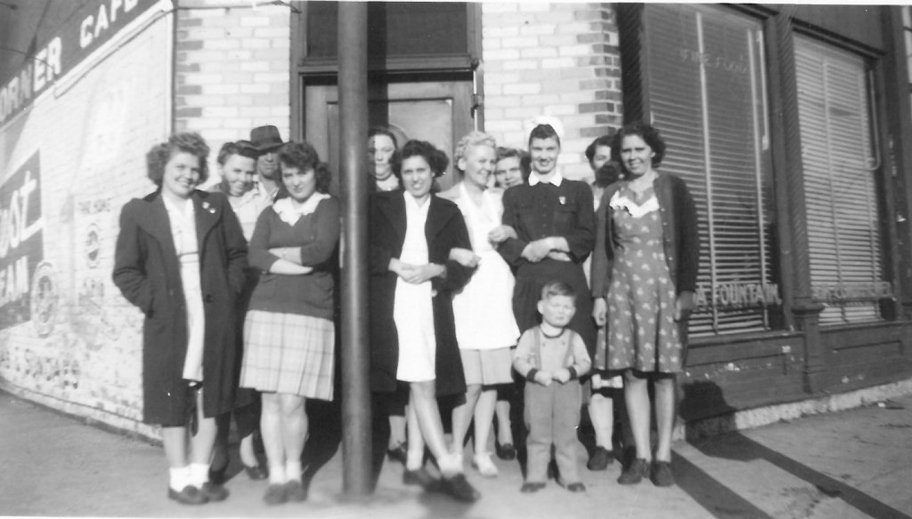 Moultrie Moment of the Week CROCKETT’S RESTAURANT- was the spot for this photo from late 1930s and submitted by Emogene Burrows of Sullivan. Formerly Bill George’s Restaurant, which is where Ms. Burrows worked in 1938 for a dollar a day.  Pictured are Barbara, Mrs. Crockett, Marvin Crockett, Blonson, Nola Wren, Francis Vandeveer, Mrs. Payne, Mrs. Barry, Jean Morn, Lean Surtzer, Wilma Hubbard and three year old Ronnie Applegate. The location is where Sullivan Pharmacy is today. Please submit photos to the News Progress for future consideration. Originals will be saved for return or forwarded to Moultrie County Historical Society.