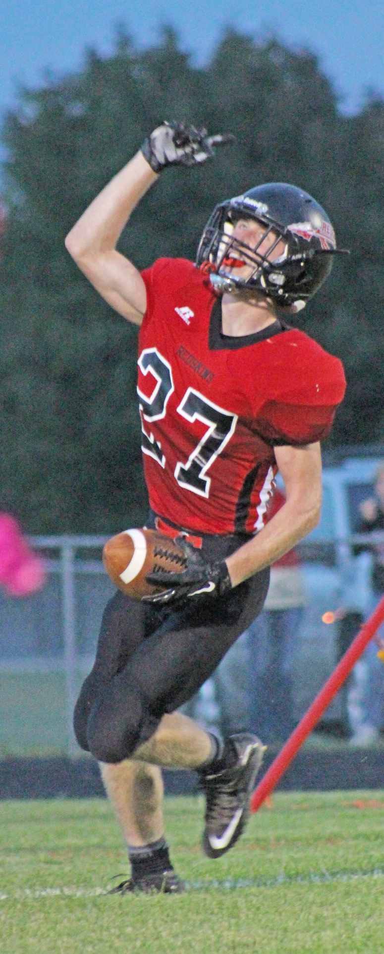 Photo by RR Best SOV  Redskin Jake Eaton celebrates following this touchdown against Warrensburg-Latham last Friday in Sullivan.