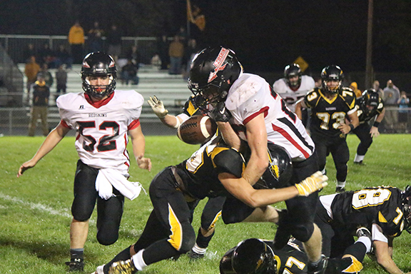 Photo by Darian Hays Tuscola Warriors were strong on offense and defense at last Friday’s game. They managed to force the SOV Redskins into more than one turnover situation such as the one above.