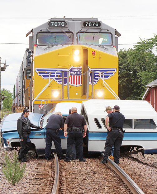 Photo by RR Best Truck meets train When a truck meets a train, usually the truck loses. On Saturday, September 12 at about 1:44 pm. the truck and driver lost. Sullivan police were called to the train crossing at Jackson and Fuller streets. There they discovered a GMC pickup against the front of a Union Pacific train locomotive. Following impact the truck was relocated 250 feet south of Jackson Street. The driver, a 69 year old male, was transported to a area hospital by Sullivan Ambulance Service.