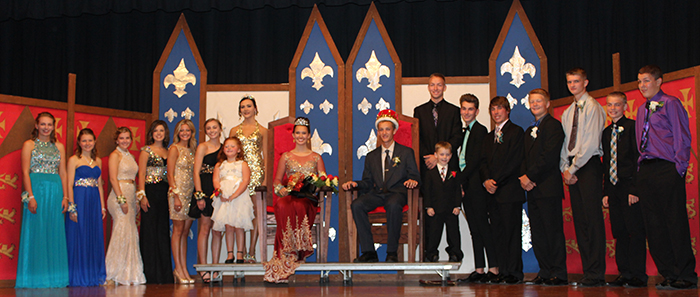 Photo by Alli Powell  ALAH Homecoming Coronation Arthur Lovington Atwood Hammond celebrated homecoming with the coronation of Knights king, queen and court Saturday, October 3 in Arthur. From left to right: Attendants: Emma Harris (freshman), Kyla Carson (sophomore), and  Erin Wildman (junior). Queen candidates: Kayla Hodge (senior), Ally Irwin (senior),  and Hannah Leal (senior). 2014 Homecoming queen, Jessica Davis and flower girl, Alana Perez. 2015 Homecoming Queen and King, Jazmine Arnett (senior) and Jakob Brewer (senior). Crown bearer, Aden Berry, 2014 Homecoming King, Jeremy Plank. King Canidates: Braxton Eckart (senior), Brenden Teak (senior), and Cade Day (senior). Attendants: Justin Laughlin (junior), Jordan Miller (sophomore), and Kyle Carnahan (freshman). 