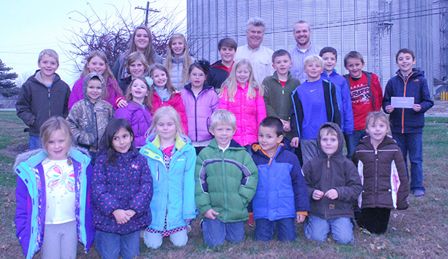 Photo Submitted Making the check presentation are Mike Schultz and Josh Snelling of ADM (Back row) with the 4-H Shining Stars. The member list includes: Anyssa Coffer, Gareth Coffer, Abagail Dean, Cora Emel, Lena Emel, Mitchell Hooten, Ellie Lehman, Kent Lehman, Rhett Lehman, Aidan Melvin, Alivia Melvin, Emily Miller, Hayden Moody,Julia Moody, Simon Parri, Devon Richardson, Lane Richardson, Gage Simmons, Peyton Simmons, Addison Stollard, Brady Stollard, Ethan Tice, Sophia Tice, Sarina Voegel, John Voyles, Kylie Voyles, Natalie Voyles, Claire Welch, Brycen Wildman Kolton Wiley.