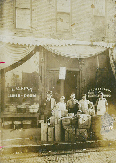 The King Lunch Room was located on the east side of the square in Sullivan and was owned and operated by Ed R. King, the tall man wearing the hat. Standing next to him is Charles Hollis, Johnny Brosam, and Bert Hollis. The man to the right was unidentified. Please submit photos to the News Progress for future consideration. Originals will be saved for return or forwarded to Moultrie County Historical Society. If you have any other information, please contact the Moultrie County Historical Society at 217-728- 4085.