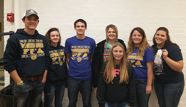 Windsor FFA in Dairy Competition Photo at left: On November 18th, the Windsor FFA attended the Dairy Foods CDE hosted by the Sangamon Valley FFA chapter.  Windsor FFA attendants were Bailey Fleshner, Travis Fox, Mackenzee Hooten, Morgan Lesko, Whitney Pepperdine, Kendra Reed, and Gage Sattler.  The sections of the CDE were cheese identification, artificial vs. real products, milker part defects, a written test and milk defects. The Windsor FFA team placed ninth overall. 