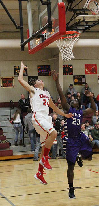 Photo by Mike Brothers Senior forward Jakob Brewer scores on this fade away shot late in the Oakwood - ALAH game last Friday.