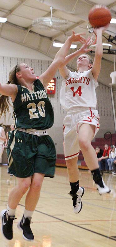 Photo by Mike Brothers Lady Knight Megan Fifer goes up for two of her six points against the Mattoon Green Wave during last Saturday’s game in Arthur.