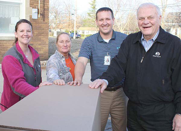 Photo by Mike Brothers Final Food Pantry delivery was made by Hydro Gear to CEFS- Pictured from L to R:  Kristy Dawson, CEFS; Kelly Brown, HG Material Handler; Chris Zerrusen, HG Safety Team Leader; Ron Harshman, Chairman of the Board of all Agri Fab Holdings.