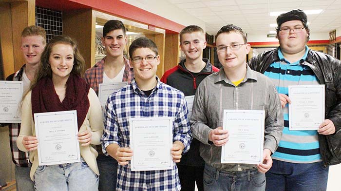 Photo by Mike Brothers Seven Scholars for Sullivan-Sullivan High School students selected as Illinois State Scholars are: (Front from left) Emily Stutzman, Ross Metzger, Ryan Baker; (back) Blake Stewart, Zane Uphoff, Adam White and Michael Hubbert.