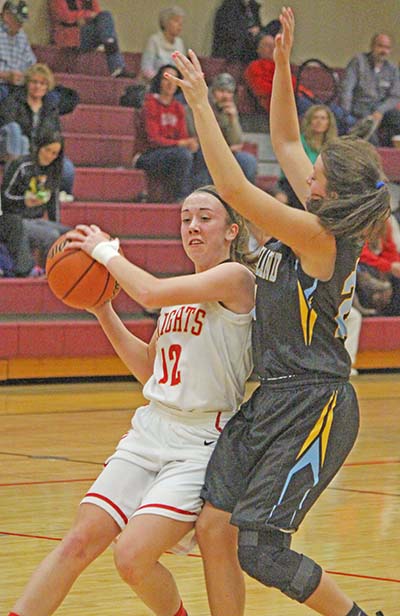 Photo by Darian Hays Lady Knight sophomore guard Abi Duzan gets around Cumberland defender during the ALAH 57-24 win last week.