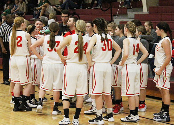 Photo Provided Arthur-Lovington/Atwood-Hammond Lady Knight coach Craig Moffett lays out the game plan as they head into the final minutes.