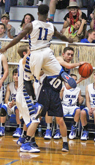 Photo by RR Best  Flying High Okaw Valley Timberwolves Pierce Bradford flies high for a block as the team faced Georgetown La Salette at home Nov 23, losing 65-48.