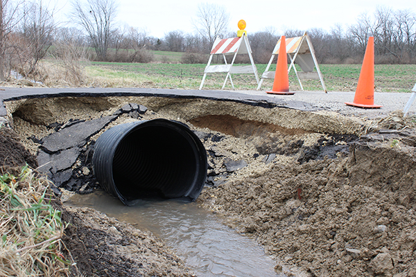 Photo by Mike Brothers Culvert Upheaval in Sullivan During the heavy rains in and around Sullivan a culvert on Patterson Street failed, taking half the street with it. Chief of Police John Love noted that the road is closed until repairs can be made to the culvert and street, and residents should seek alternative routes.