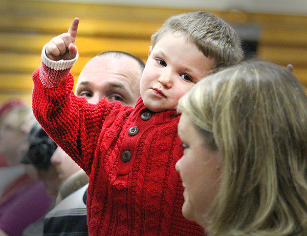 Photo by RR Best Guest Conductor The Sullivan Elementary and Middle School holiday program was presented to the public last week. Above young Wyatt Adams is so moved by the music he becomes the guest conductor.