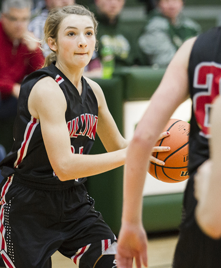 Photo by Keith Stewart Freshman Brooke Tuttle eyes the basket during Sullivan’s game against St. Anthony last Monday. Tuttle would have a solid performance throughout the three-day tourney with 47 points.